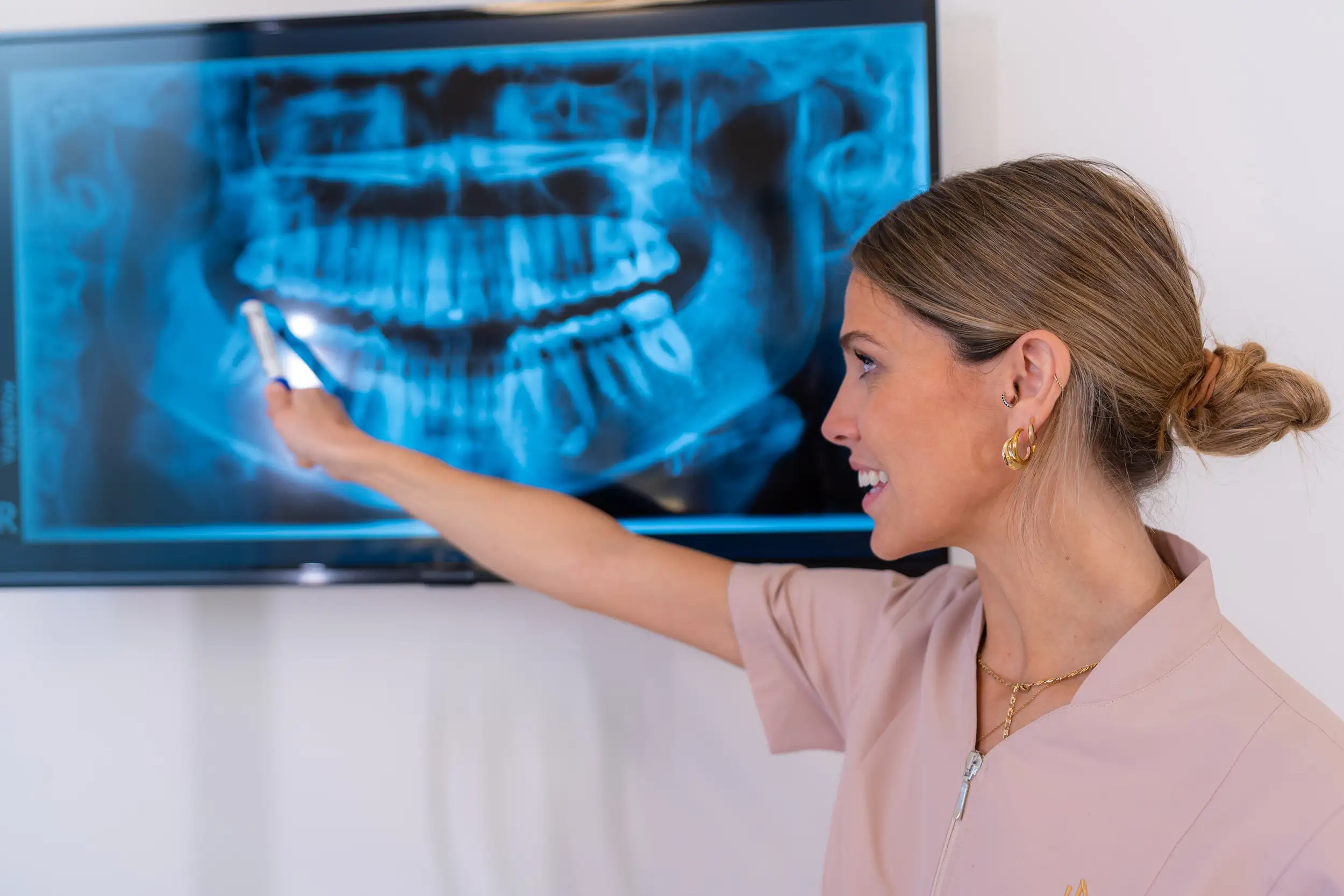 dentist presenting x-rays